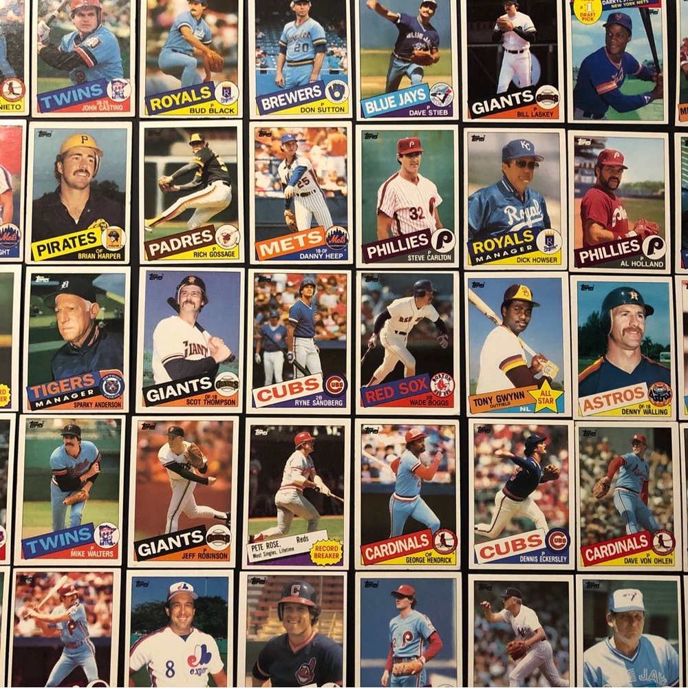 (64) 1985 Topps baseball cards Nolan Ryan Rickey Henderson Sandberg Gwynn Rose